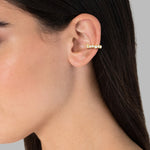 Ohrklemme gelbgold verziert mit Kristallen von Swarovski® weiß