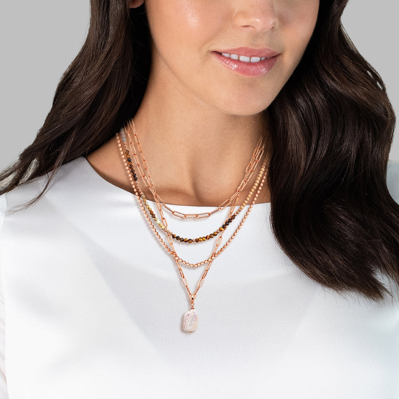 Kette mit Anhänger gelbgold Muschelkernperle weiß